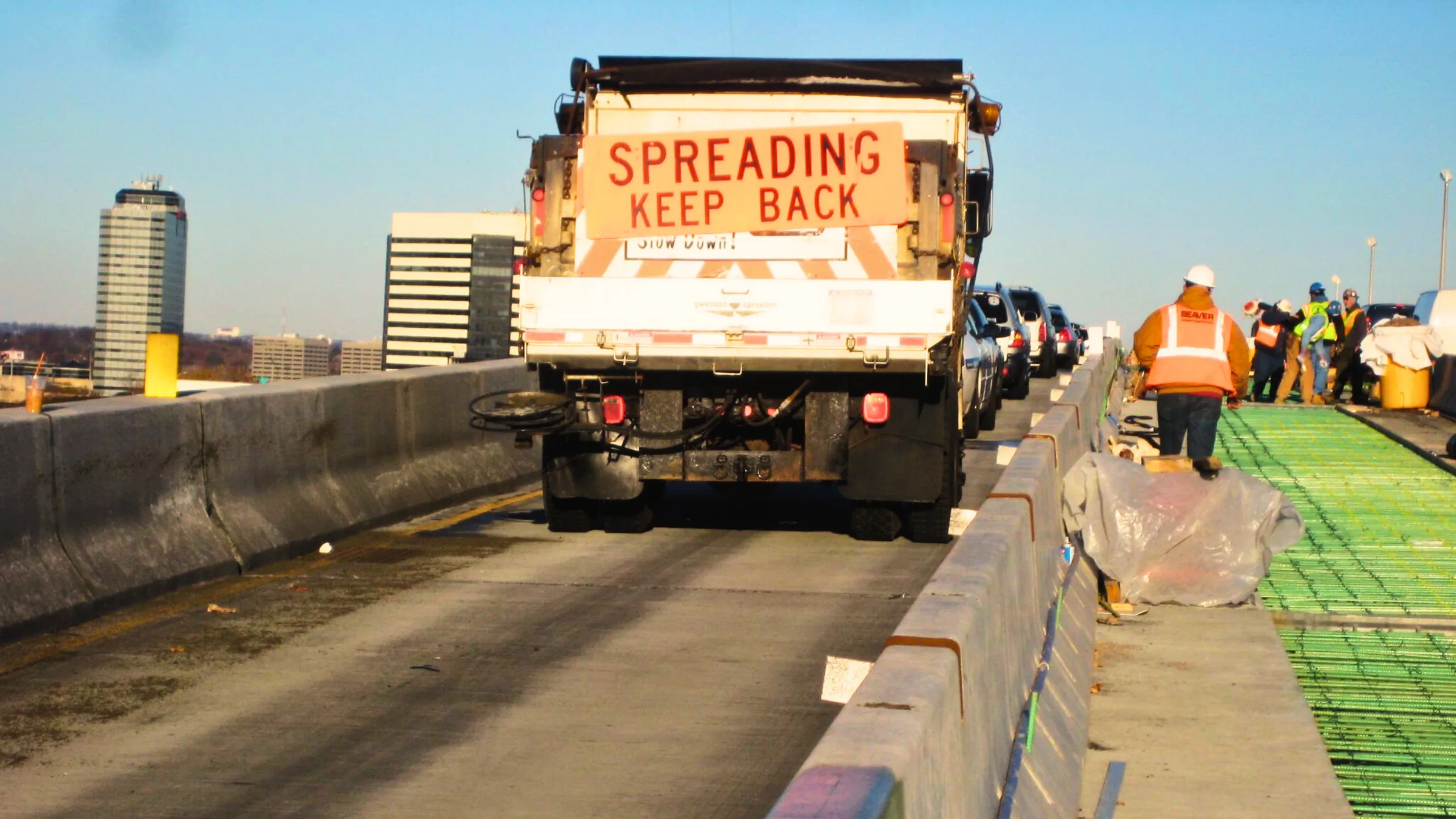 2024 Construction Safety Law Review 1 Construction workers working on a highway.