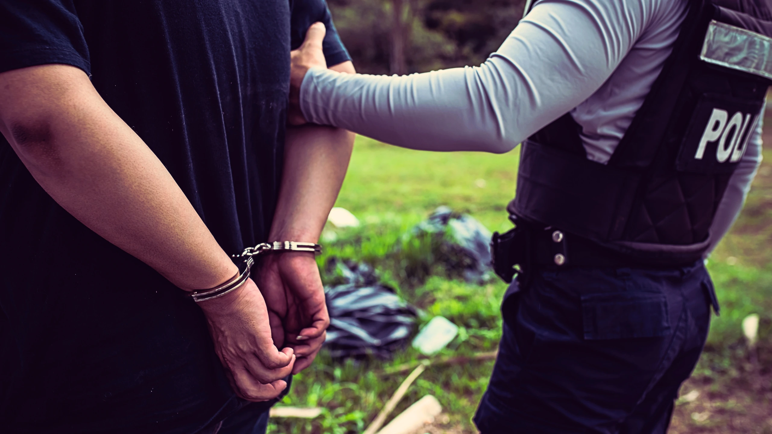 Immigrant Detained 8 Months for Turnstile Jumping Is Entitled to Bond Hearing 1 Guy being arrested by a police officer.