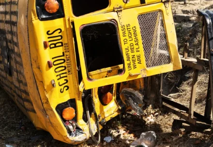 Wrecked yellow school bus.