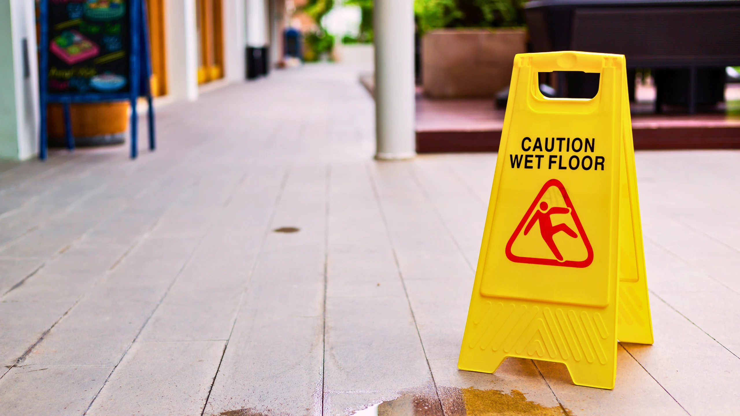 Yellow wet floor signage.