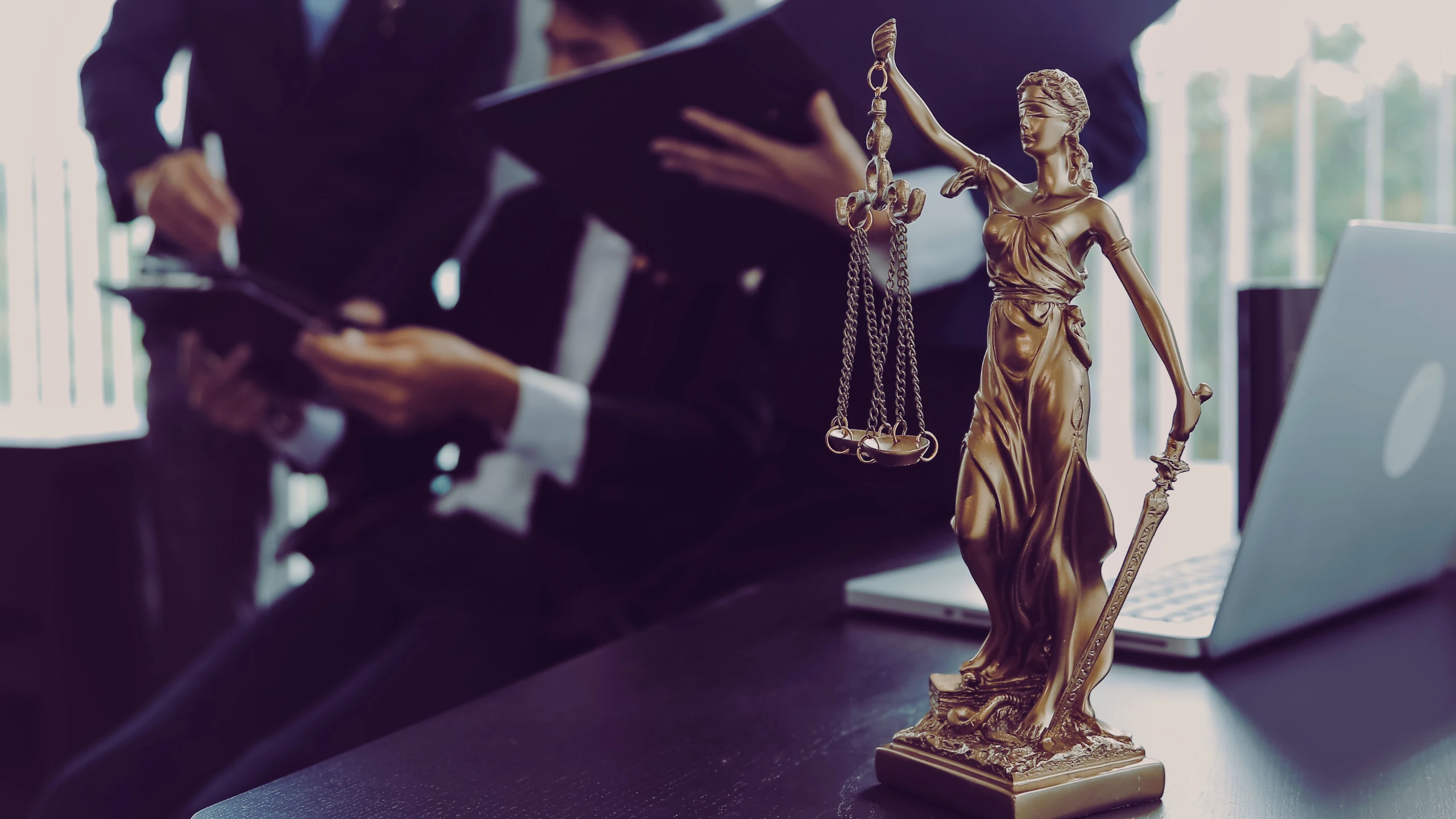 Business Disputes Among Partners a Business Break up Is Like a Divorce You Need a Strong Advocate in Your Corner 4 Lady justice with a team of lawyer on the background.