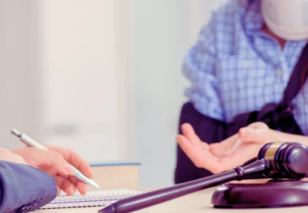 Injured woman talking to her lawyer.
