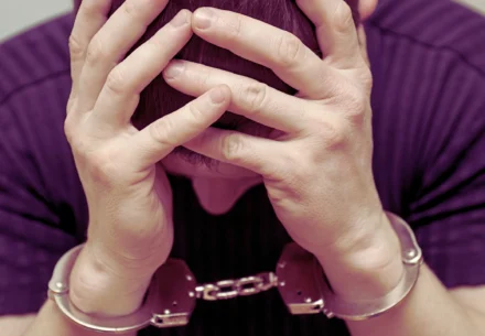 Depressed guy with handcuff.