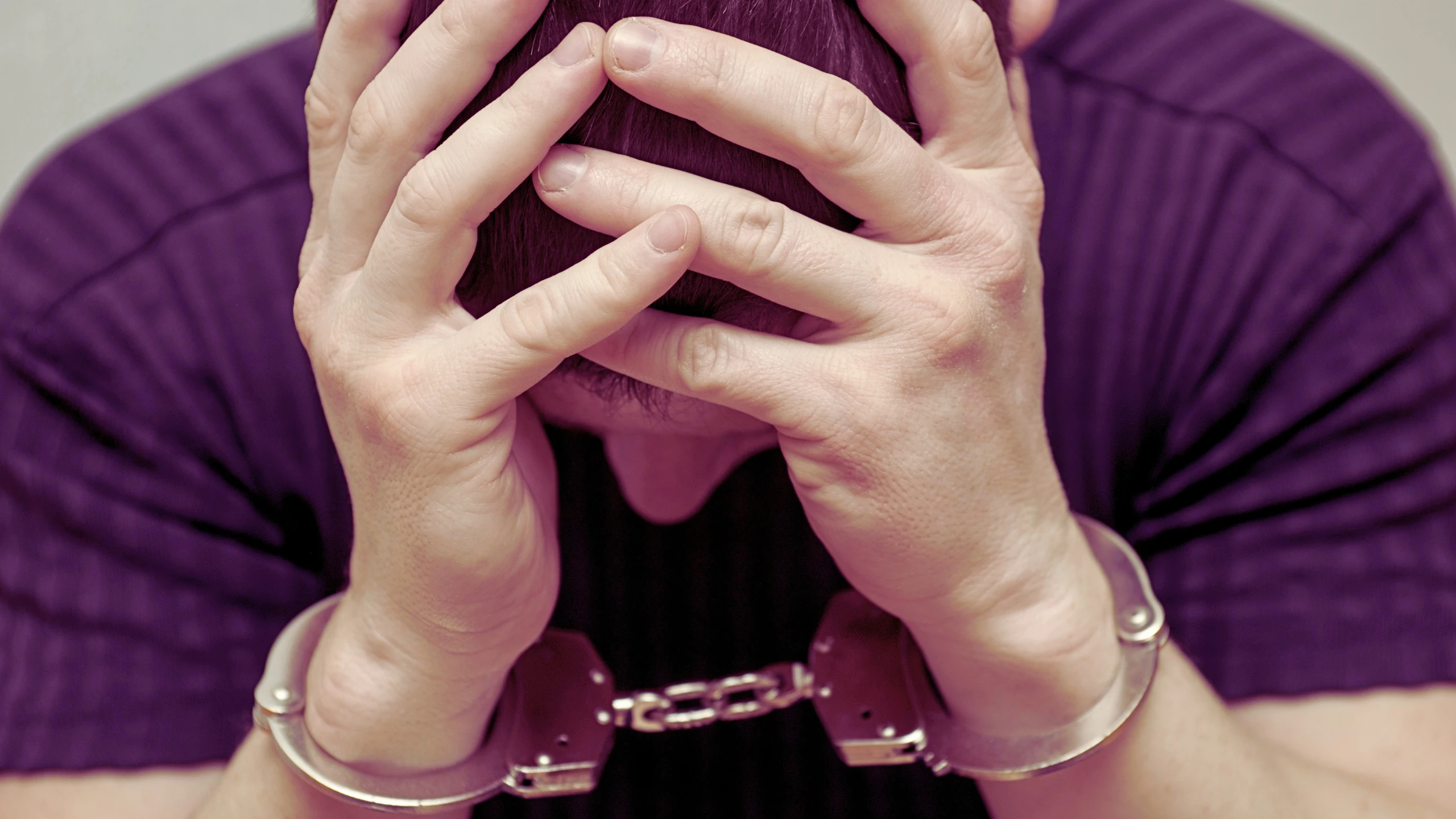 Arrest, Bail, Bond And Arraignment 1 Depressed guy with handcuff.