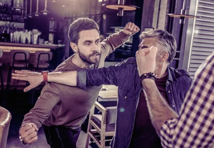 Fist fight on the bar.