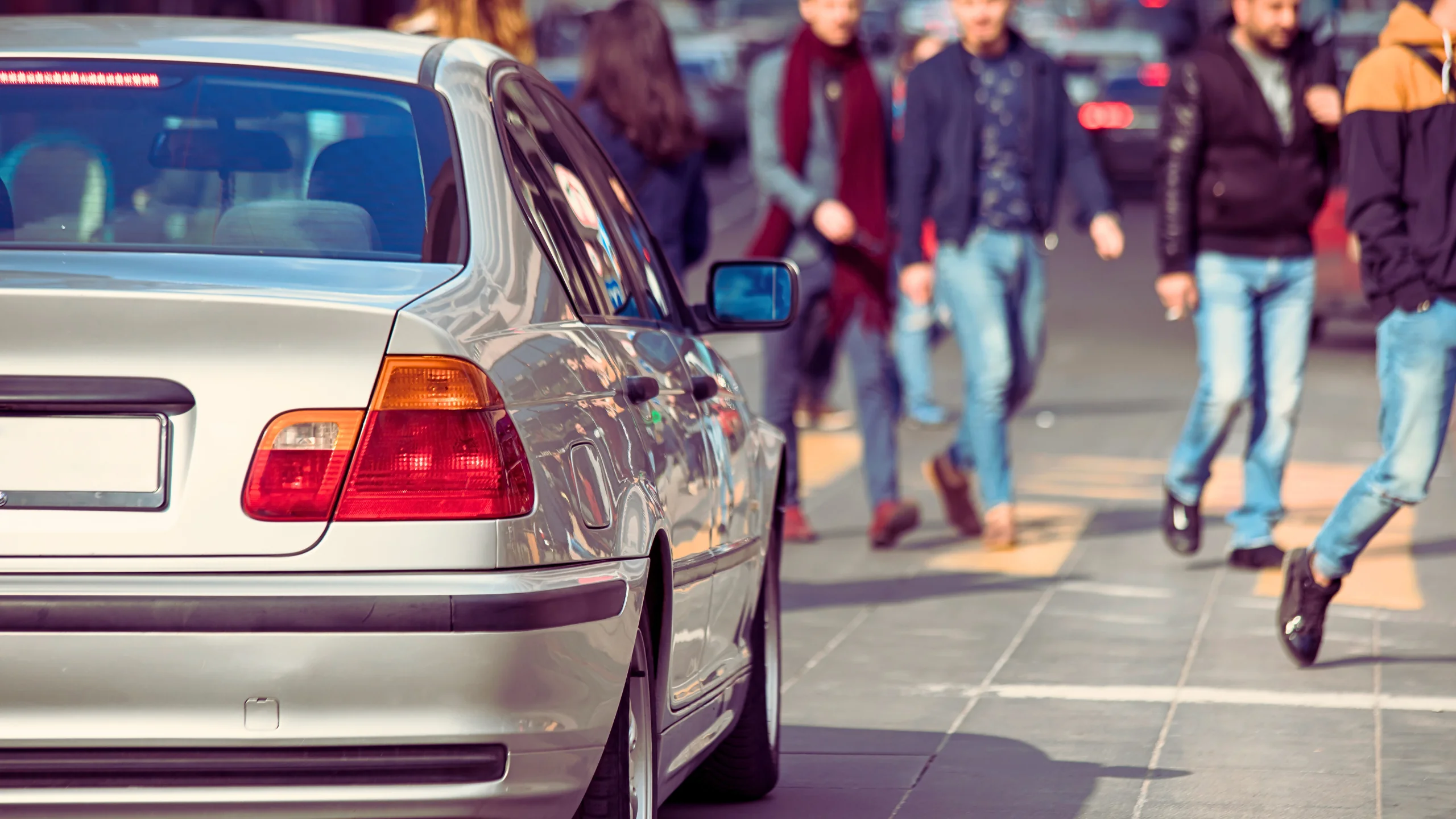 Is The Driver Or Pedestrian At Fault In A Car-Pedestrian Accident? 3 Pedestrians passing on the street.