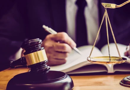 Lawyer and a gavel and scale.