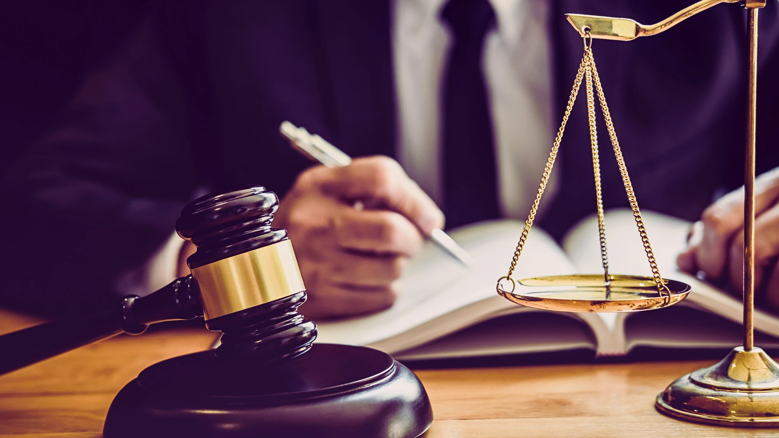 We Fight To Win 1 Lawyer and a gavel and scale.