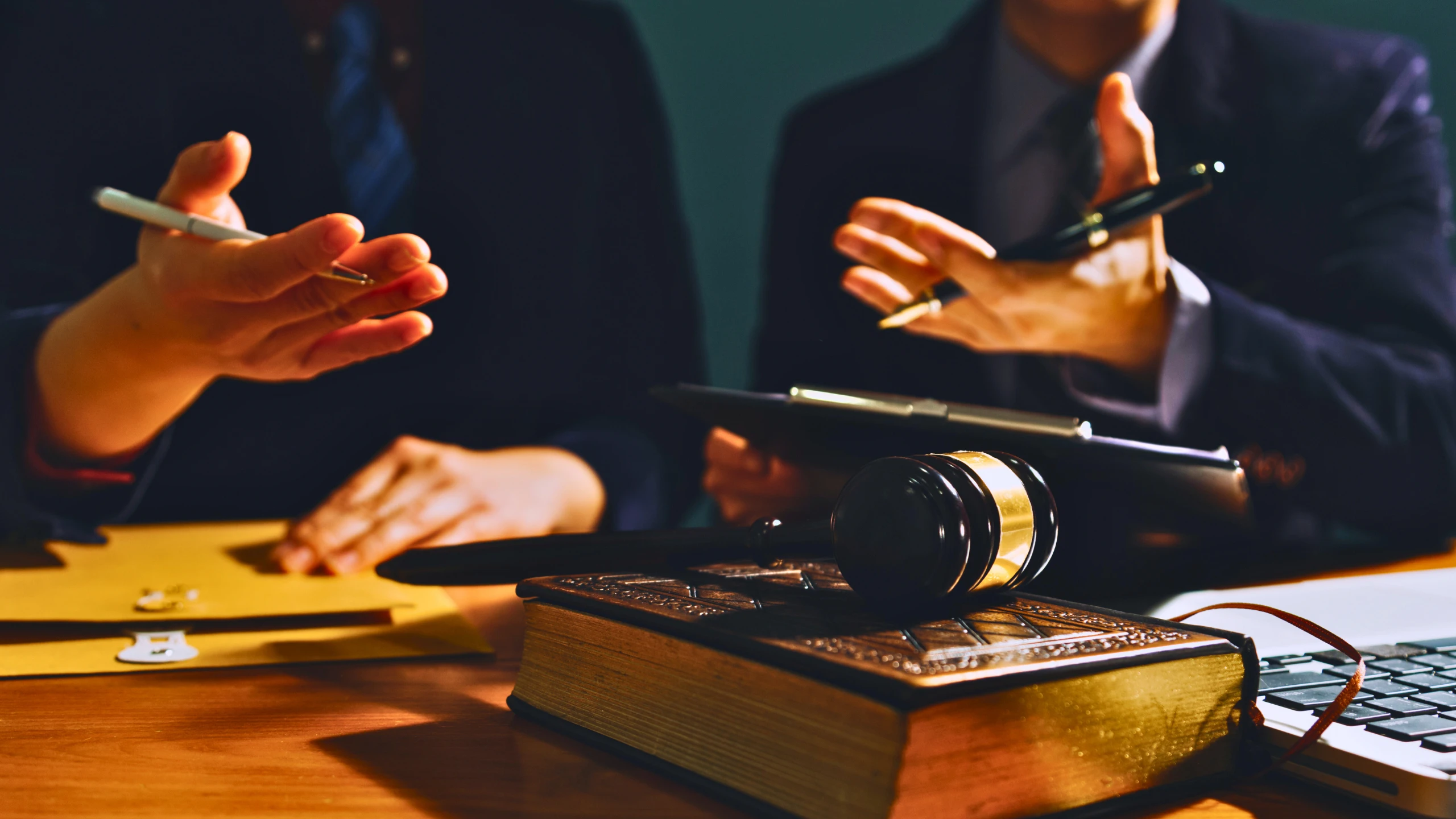 What Can I Do If My Attorney Cheated Me or Stole my Money 1 A judge's gavel rests on a book during a legal discussion.